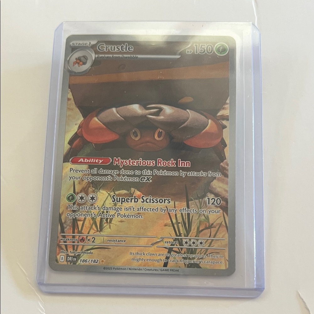 Crustle Trading Card with Mysterious Rock Inn Ability